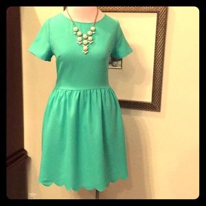 Gianni Bini mint green dress with scallop hem.